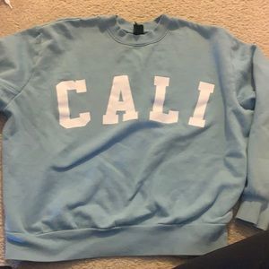 light blue-ish crew neck